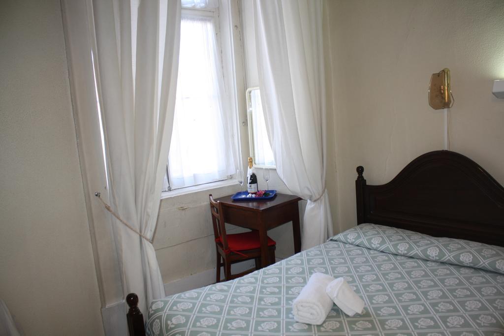 Pensao Residencial Estrela Do Mondego Hotel Lisboa Værelse billede