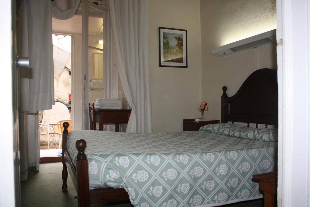 Pensao Residencial Estrela Do Mondego Hotel Lisboa Værelse billede